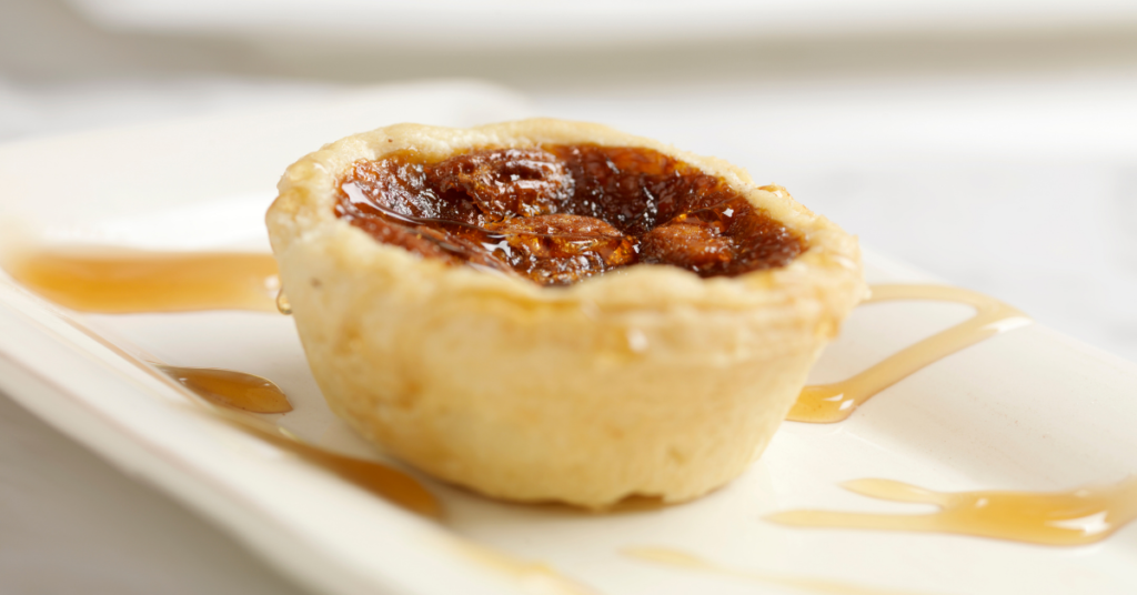Picture of a home baked butter tart, made with the Company’s Coming Butter Tarts Recipe.
