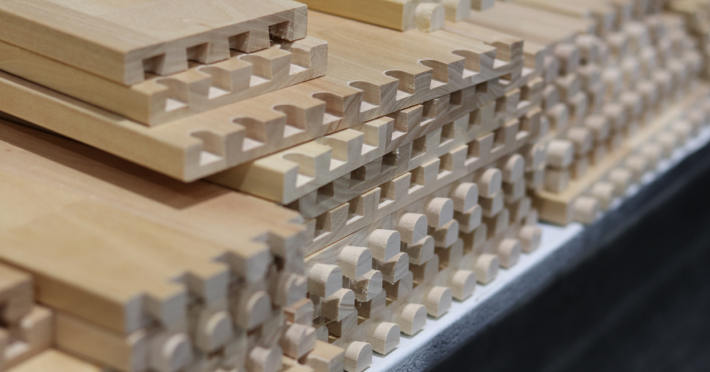 Pieces unassembled of finger-jointed dovetail cabinet material in Birch wood in the superior cabinets factory in Saskatoon, Saskatchewan, Canada. 