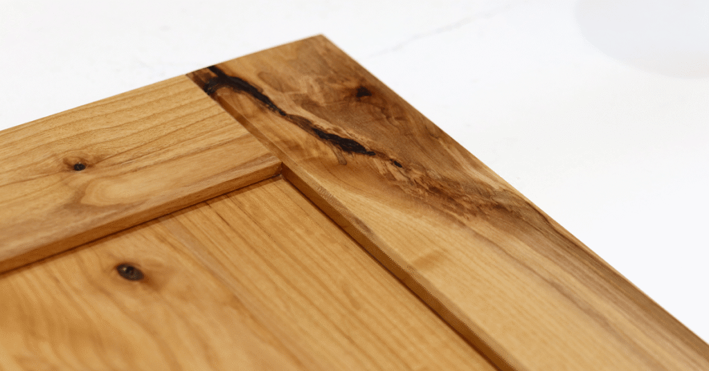 a ructic alder door with a 3" wide v-groove chamfered shared door. 